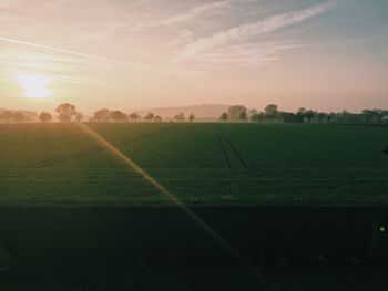 Scenic view of landscape at sunset