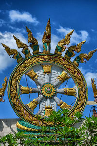 Low angle view of statue against sky
