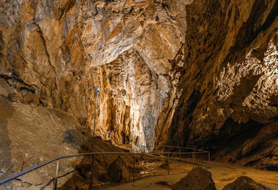 Formations in a karst cave. stalagmites and stalactites. path, walkway.