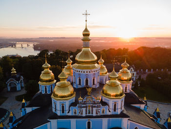 High angle view of temple building against sky during sunset