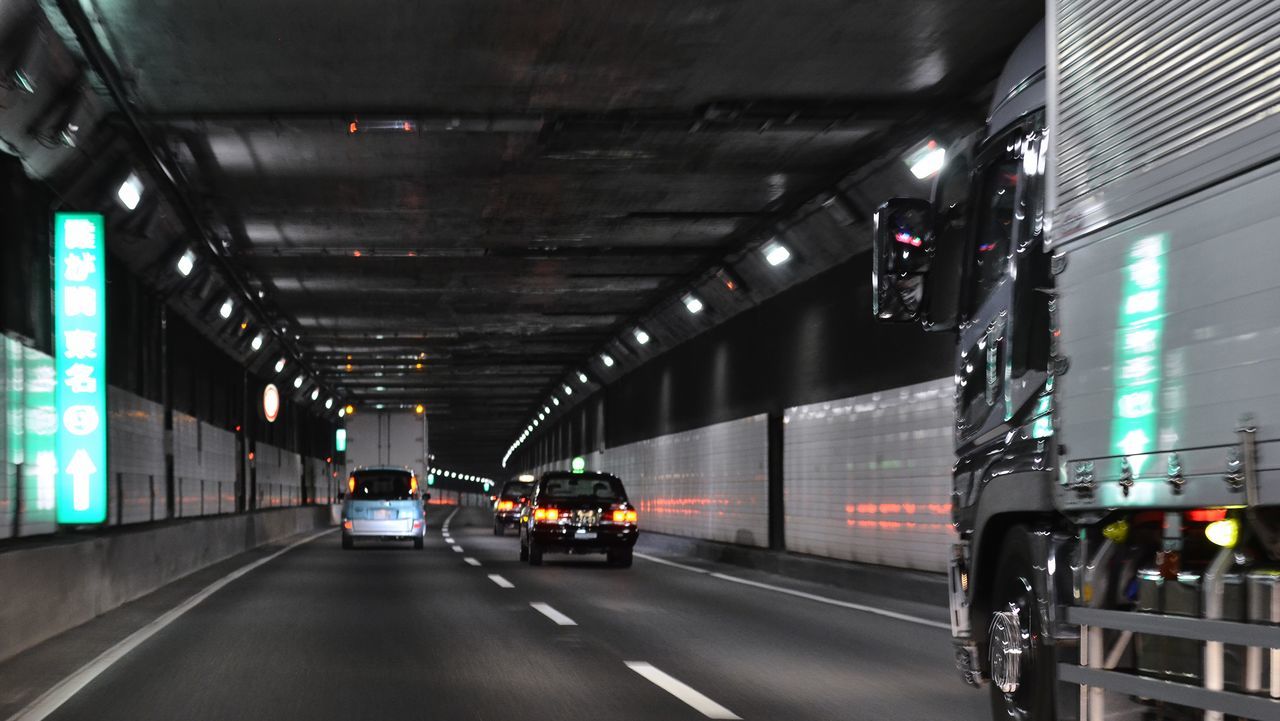 illuminated, transportation, land vehicle, lighting equipment, mode of transport, night, the way forward, car, architecture, built structure, indoors, road, no people, city