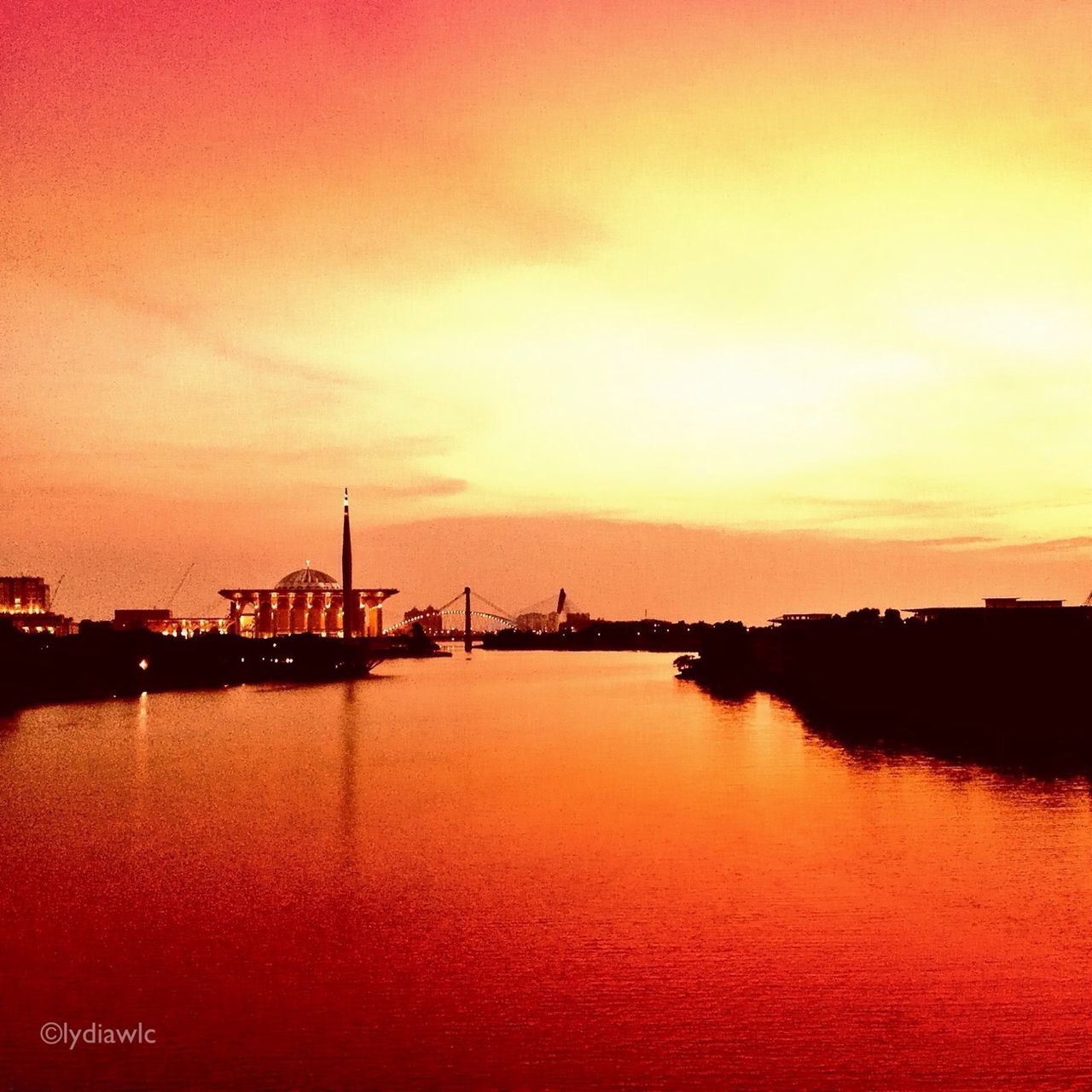 sunset, water, waterfront, orange color, silhouette, sky, built structure, architecture, reflection, river, tranquil scene, scenics, tranquility, beauty in nature, nature, rippled, sea, idyllic, lake, connection