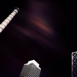 Low angle view of modern buildings against sky