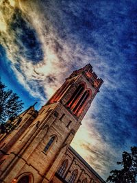 Low angle view of built structure against blue sky