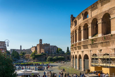 Group of people in front of historical building