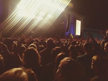 Group of people enjoying music concert