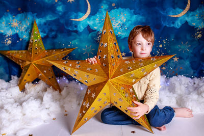 Close-up of star shapes on snow