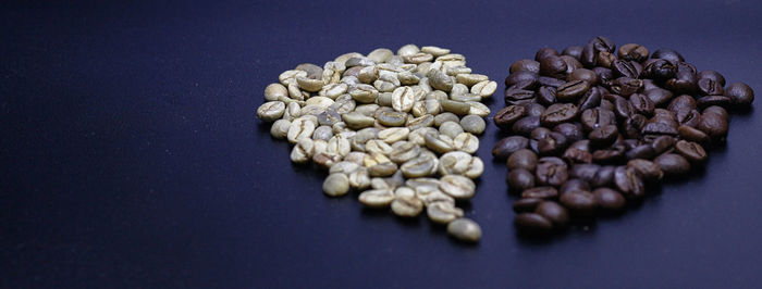 Close-up of coffee beans against black background