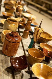 Close-up of handmade wooden objects on table