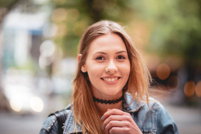 Portrait of smiling young woman