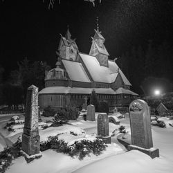 Panoramic view of illuminated cathedral during winter at night