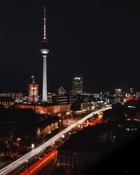 Illuminated buildings in city at night