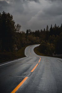 Empty road against sky