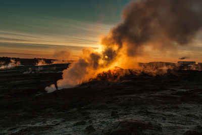 Scenic view of landscape against sky during sunset