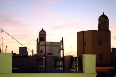 Church against sky during sunset