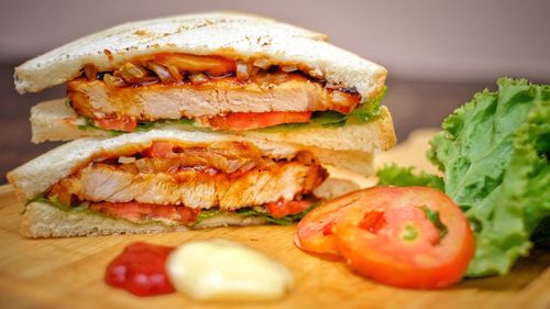 Close-up of sandwiches on cutting board