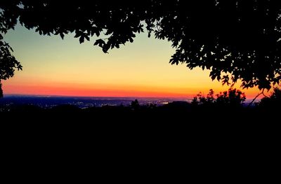 Scenic view of silhouette landscape against sky during sunset