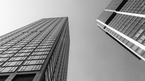 Low angle view of modern buildings against clear sky