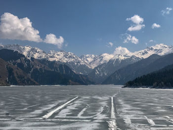 Scenic view of snowcapped mountains against sky