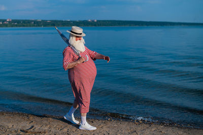 Woman standing on beach