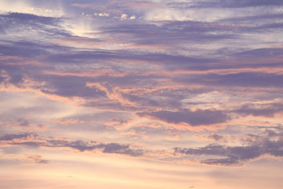 Low angle view of clouds in sky during sunset