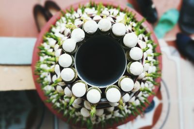 High angle view of flowers in bowl on table