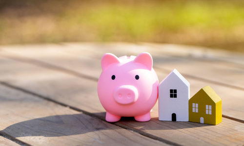 Close-up of piggy bank on table