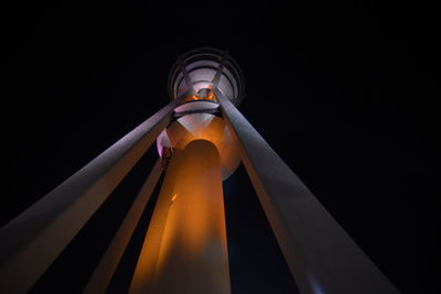 Low angle view of illuminated built structure against sky