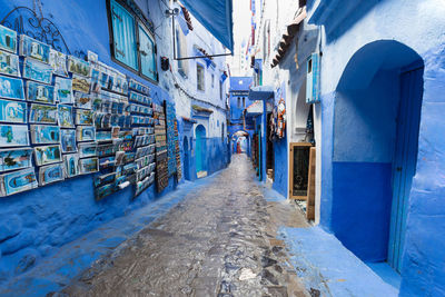 Alley amidst buildings in city