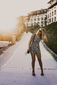 Young woman standing outdoors