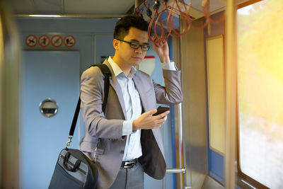 Young man using smart phone