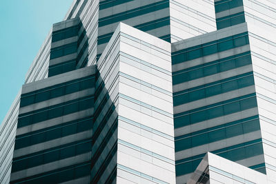 Low angle view of modern buildings against clear sky