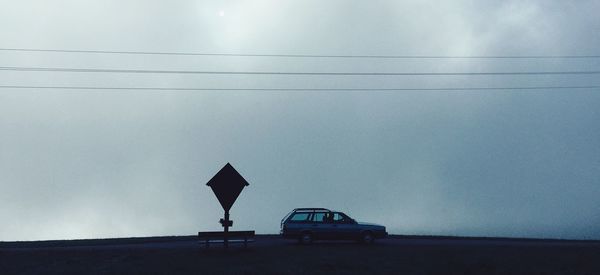 Low angle view of street light against sky