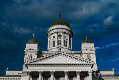 Low angle view of building against blue sky