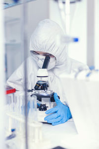 Scientist examining chemical in laboratory