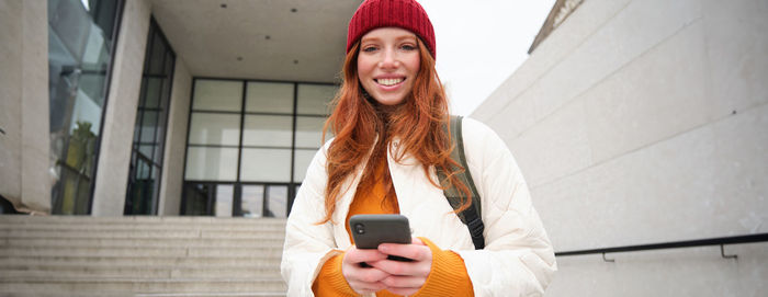 Young woman using mobile phone