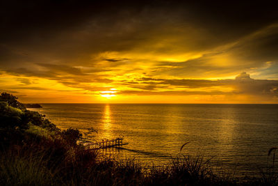 Scenic view of sea against sky during sunset