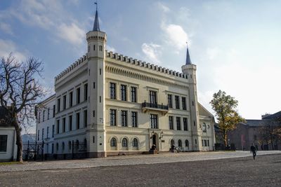 View of building against cloudy sky