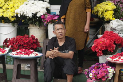 Portrait of a man in a flower shop  