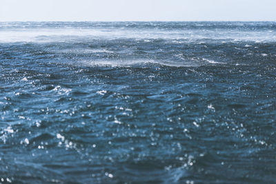 Close-up of rippled sea against sky