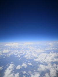 Aerial view of cloudscape against blue sky