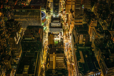 High angle view of illuminated buildings at night