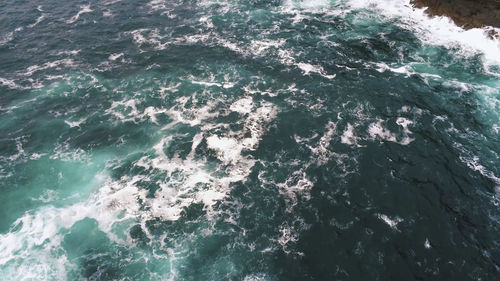 Full frame shot of rocks in sea