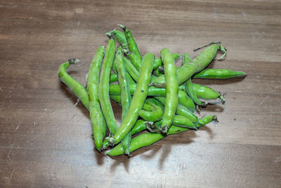 High angle view of green chili pepper on table