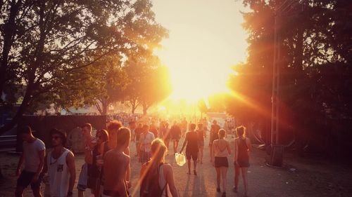 Silhouette of people standing in park