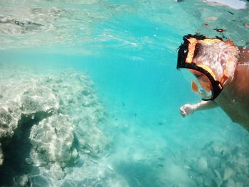 Man swimming in pool