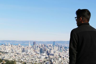 Rear view of a man looking at view