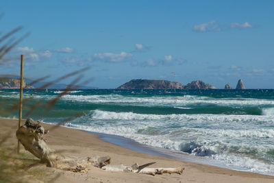 Scenic view of beach against sky