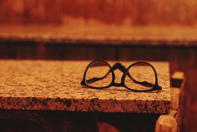 Close-up of eyeglasses on table