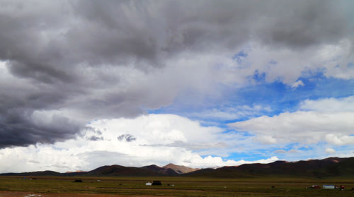 Storm clouds over landscape